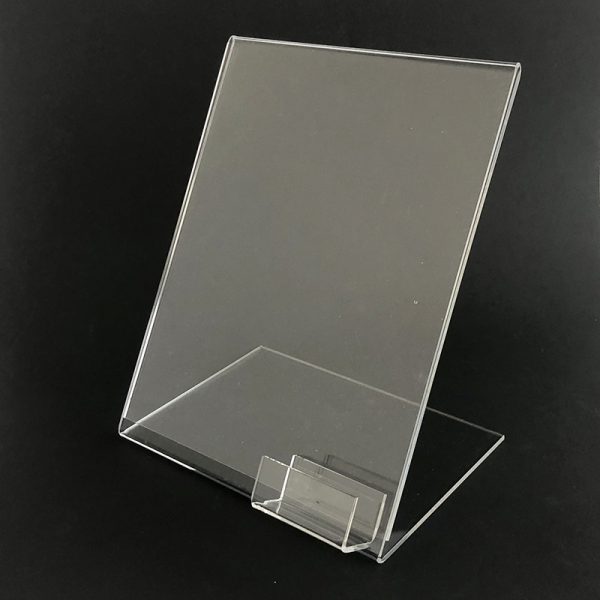 Stojanček na diaľkové ovládanie s miestom na plagát